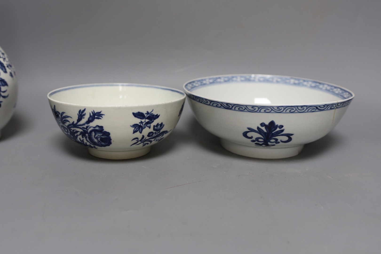 A Chaffers Liverpool rare bowl, a Worcester bowl, a mug with the Gilliflower pattern, three further Worcester teawares, Chrysanthemum, Mansfield and Prunus Root and a Worcester guglet, all late 18th century, Largest 23cm